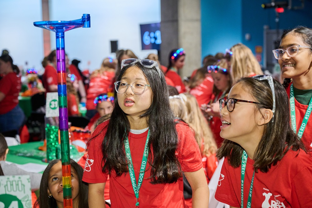Girls building a tower.